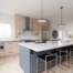 Modern kitchen renovation with black matte fixtures