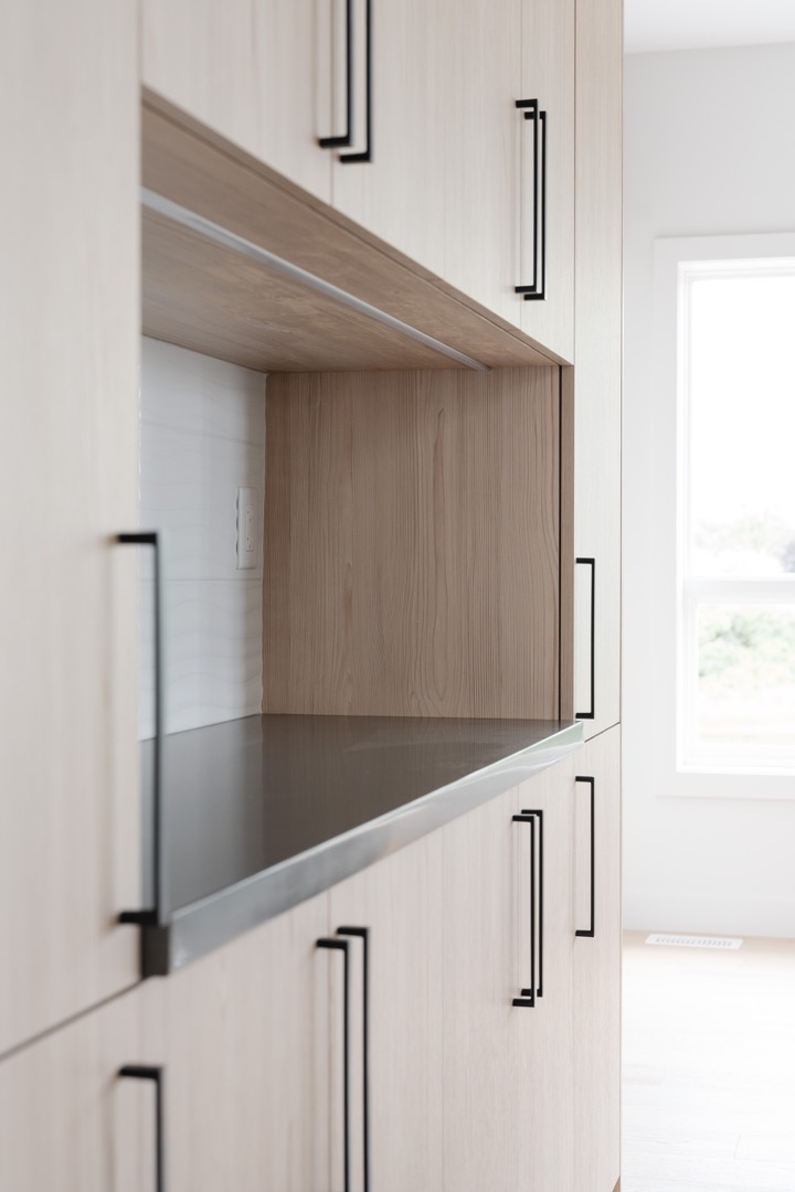 kitchen cabinetry with built in nook