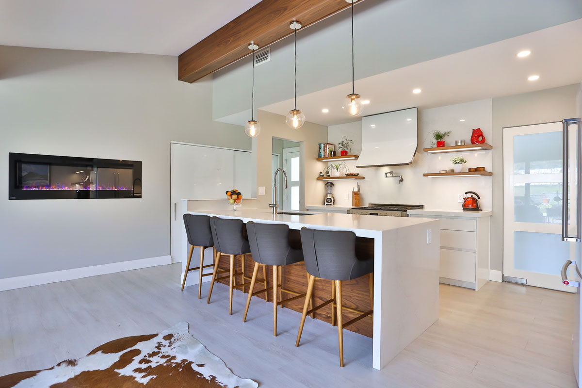 Modern clean white kitchen design with clean lines and colorful accents