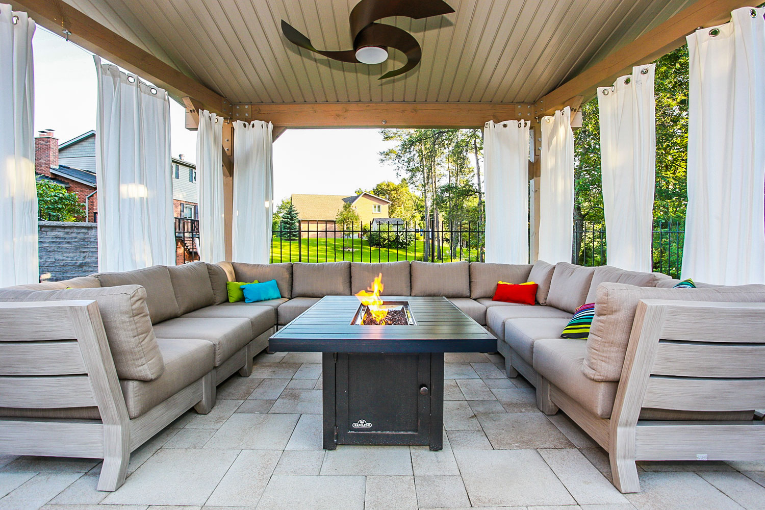 outdoor home renovation with a seating area and fan
