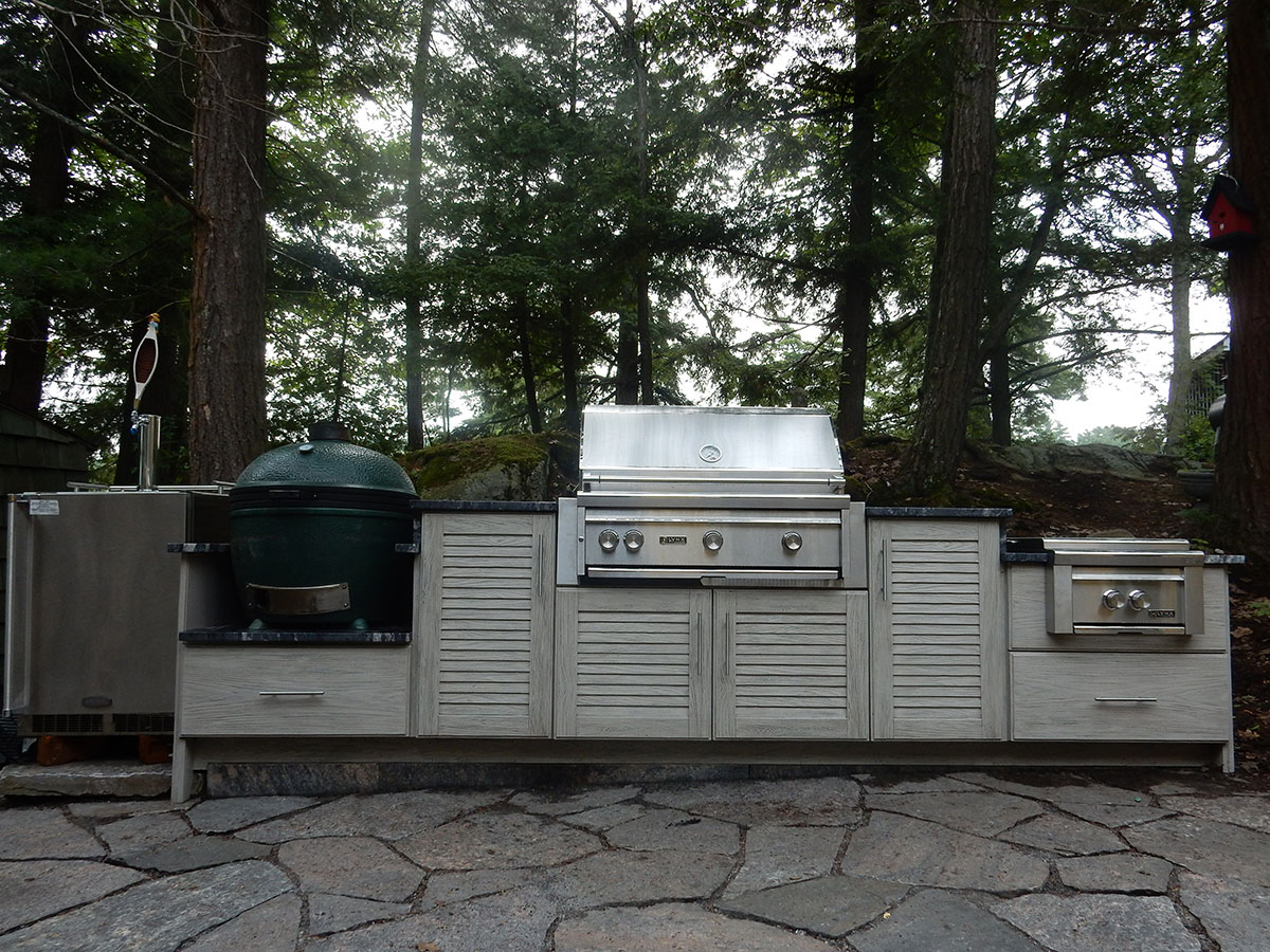 Outdoor Kitchen Design and Installation with NatureKast Outdoor Cabinets and Barbecue by Total Living Concepts
