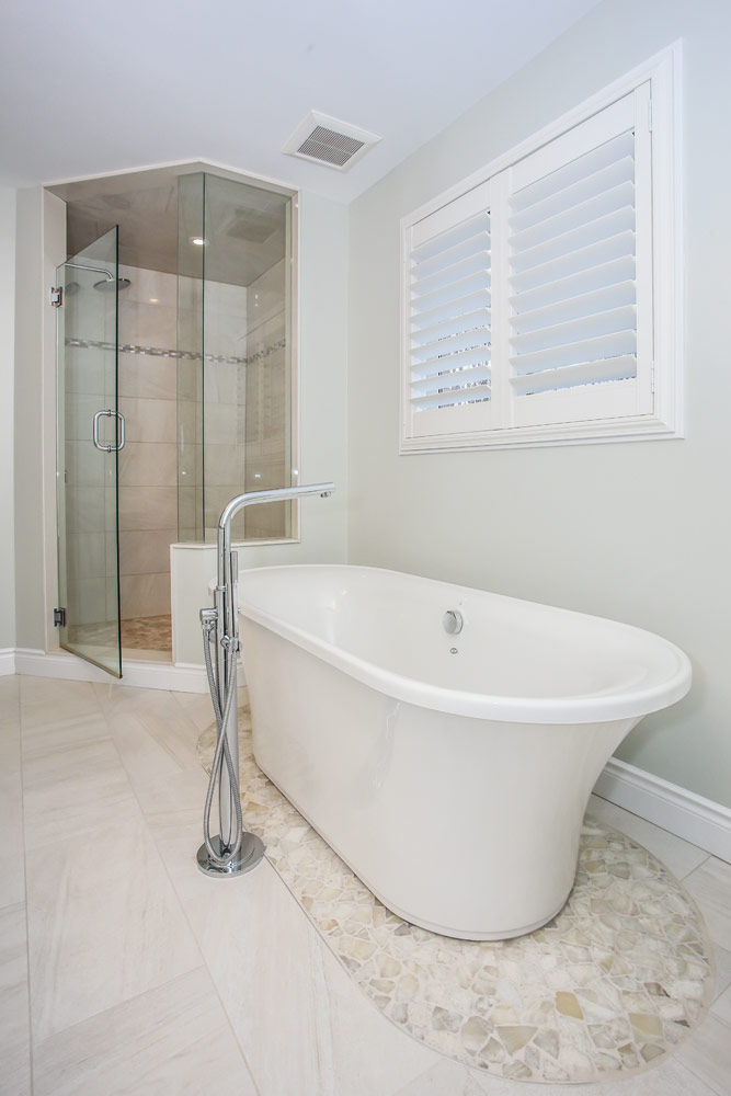 calming spa bathroom, white bathroom design, floating tub, soaker tub