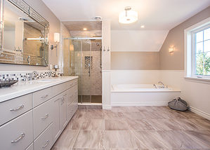 Large farmhouse style ensuite featuring warm greys and whites - Total Living Concepts barrie ontario